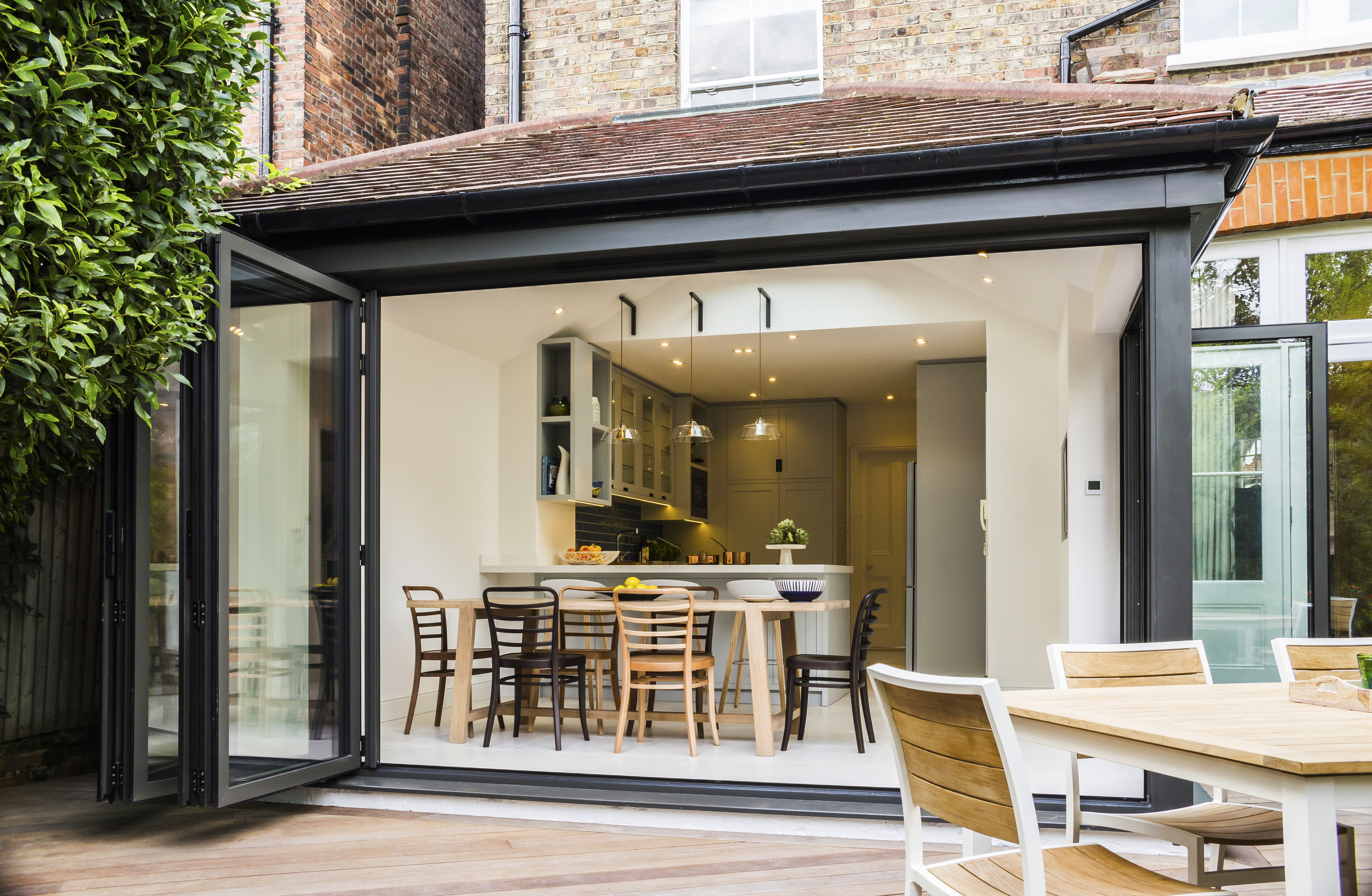 Photo of well-lit stylish kitchen diner